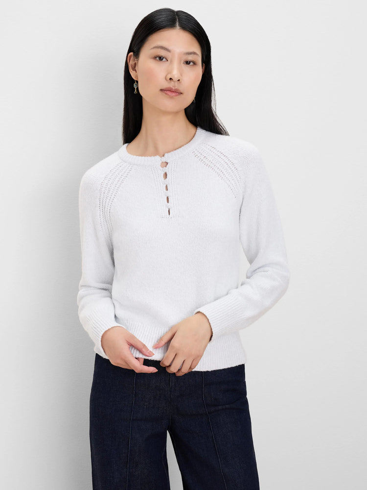 Pale grey knit sweater features a round neck, 4-button henley placket, textured raglan sleeves, and ribbed cuffs/hem.