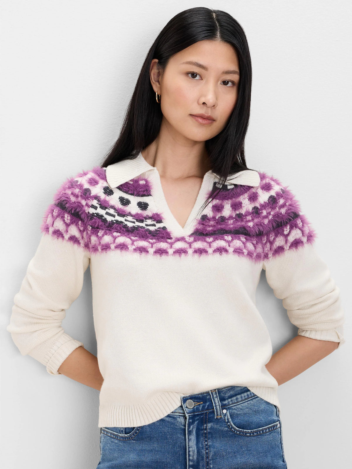 Off-white Fairisle polo sweater with fuzzy purple & dark gray pattern across chest. V-neck.