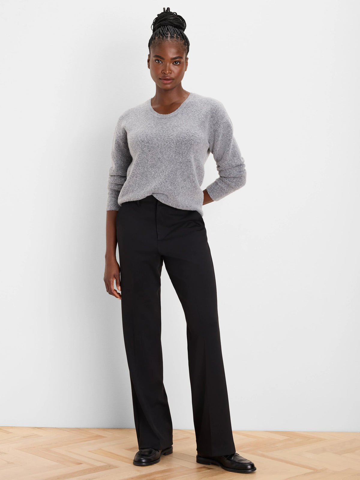 Light grey Slouchy Scoop Sweater on a model, showing its relaxed fit and fuzzy knit texture.