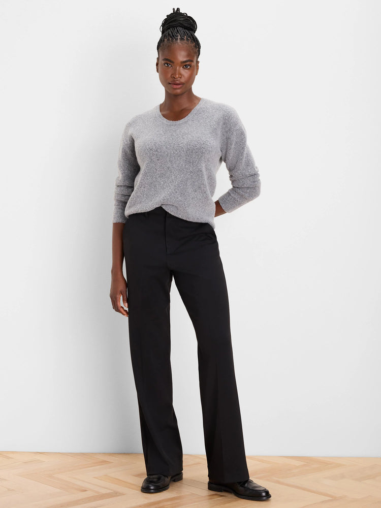 Light grey Slouchy Scoop Sweater on a model, showing its relaxed fit and fuzzy knit texture.