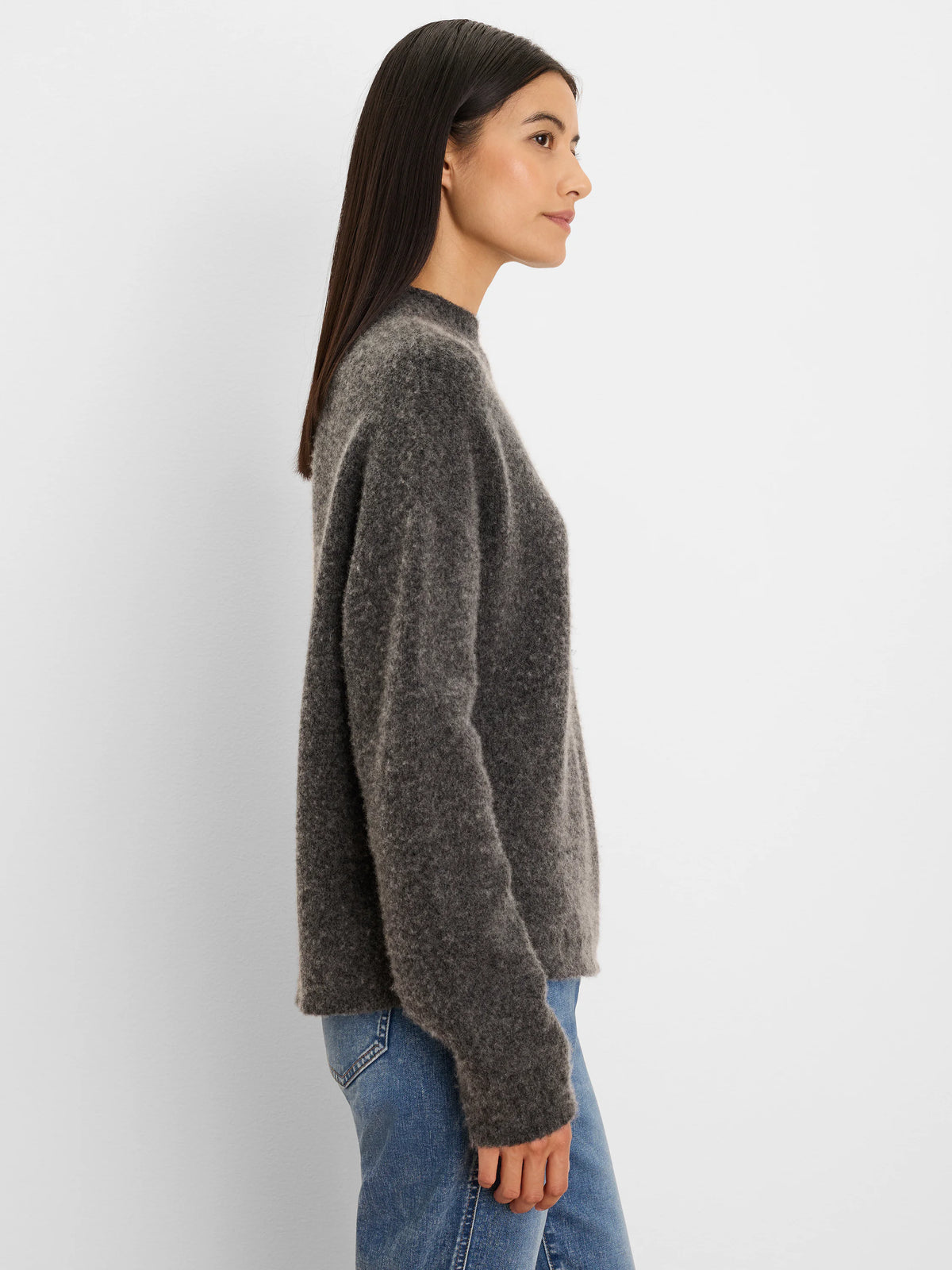 Dark gray, fuzzy knit mock neck sweater with a relaxed fit.