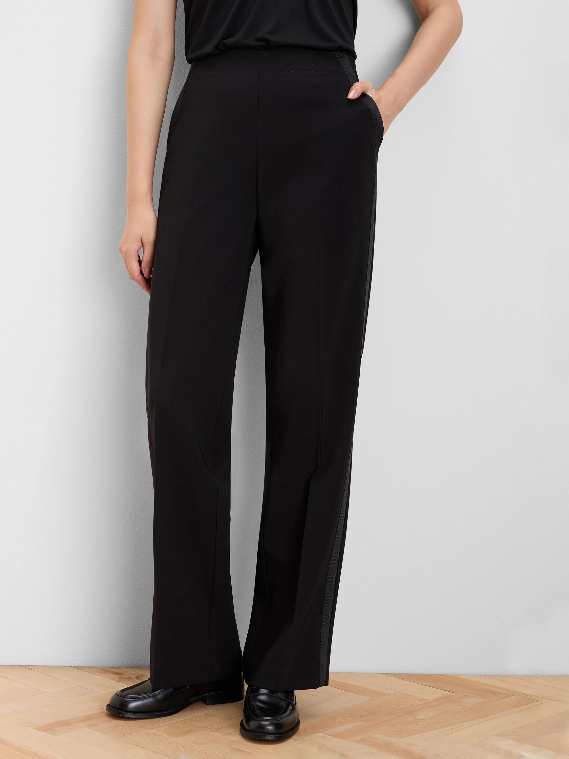 Black pants with subtle grosgrain side stripes, full length and side pockets.