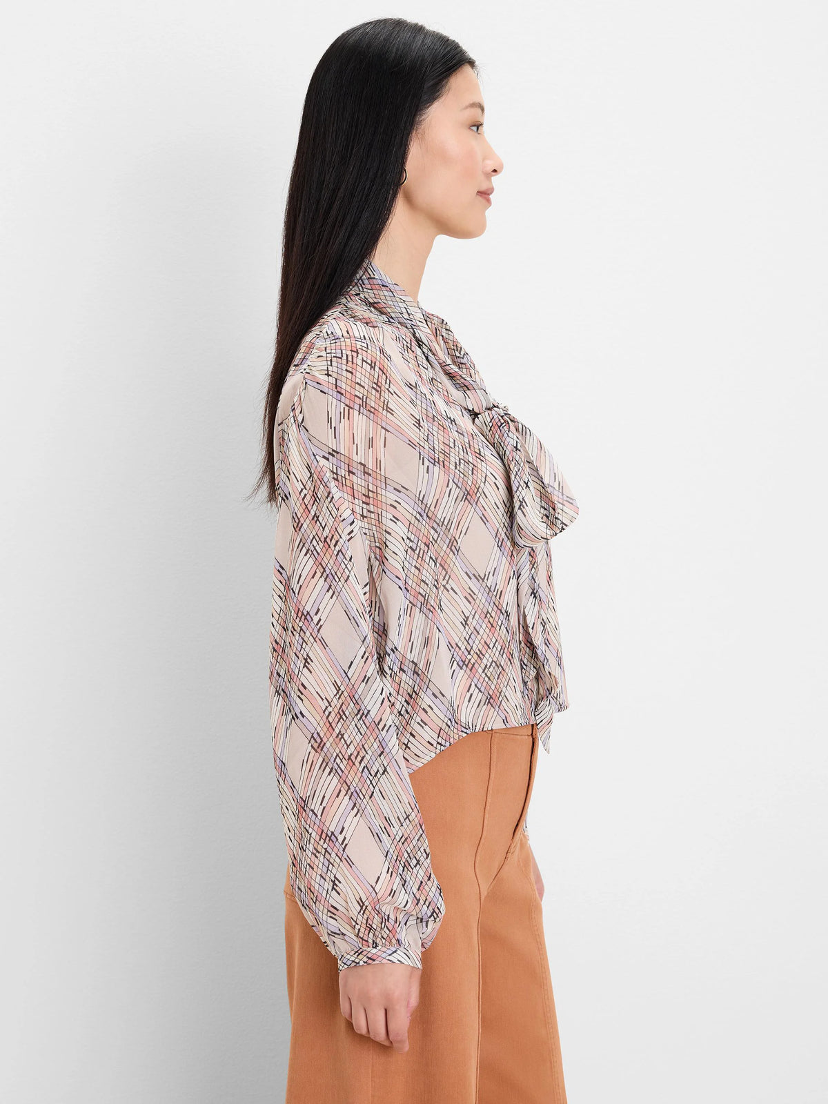 Tie-neck shirt, light beige with painted plaid in pink, lavender, and brown lines.