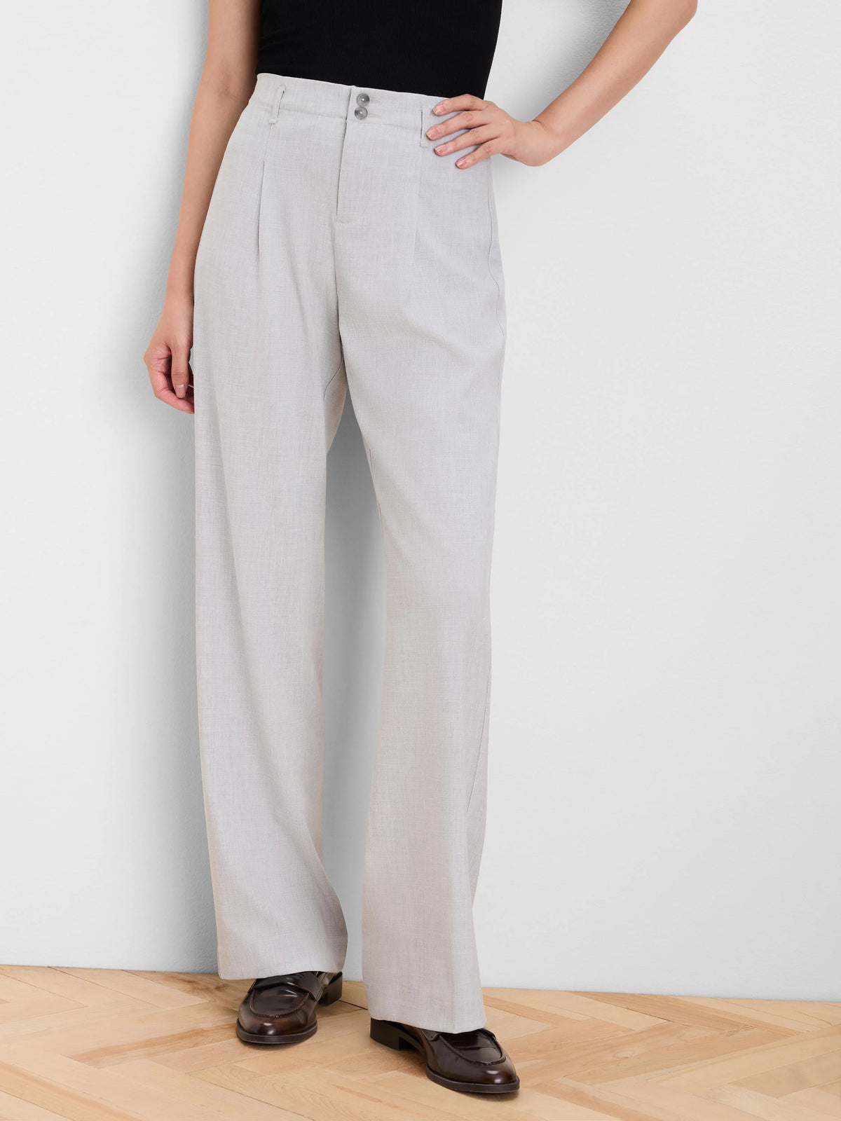 Light grey wide-leg crepe trousers with a high waist, front pleats, and double button closure.
