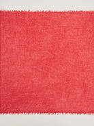 Bright red cashmere neck scarf, lightweight and sheer with a visible textured weave and delicate fringed edges.