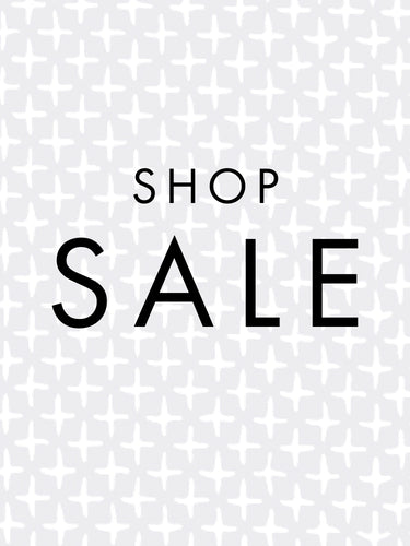 Black 'SHOP SALE' text on a white geometric patterned background