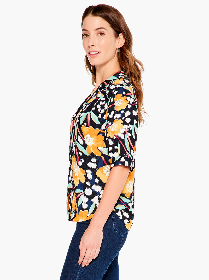 Woman Wears Flower Burst Shirt image number 1