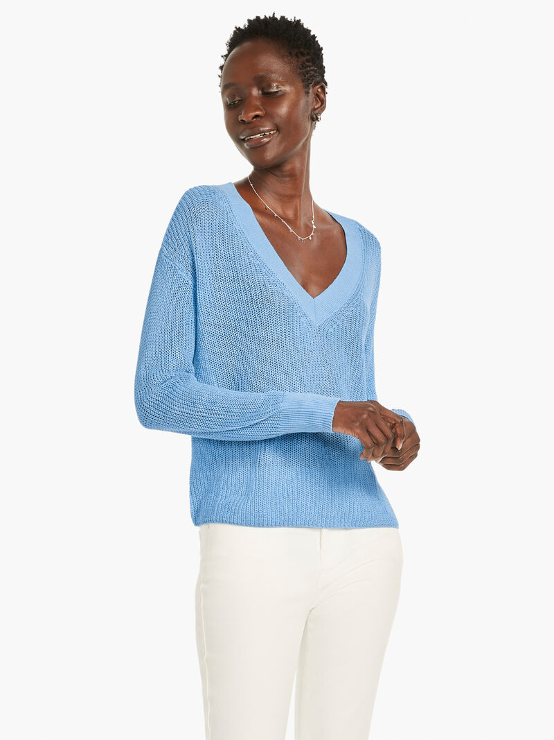 Woman Wears Textural V-Neck Summer Sweater image number 0