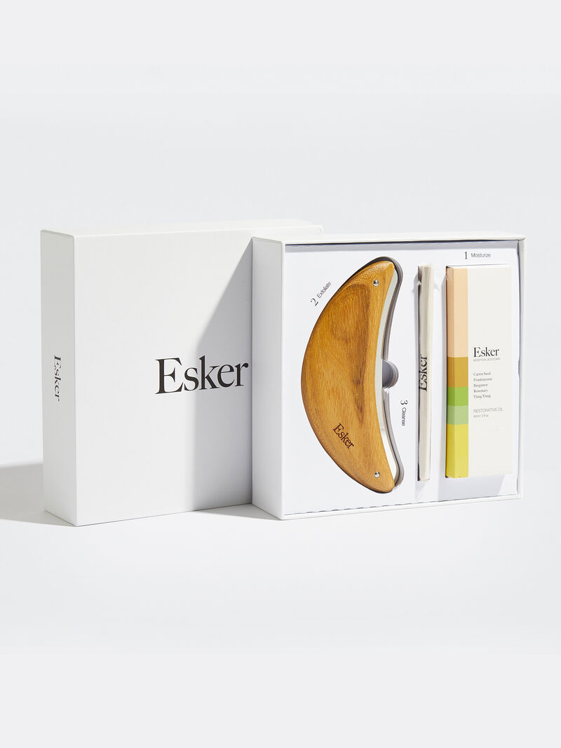 Woman Wears Esker - Restorative Body Plane/Oil Set image number 2