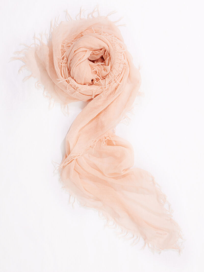 Woman Wears Chan Luu Solid Scarf With Fringe Edges image number 0