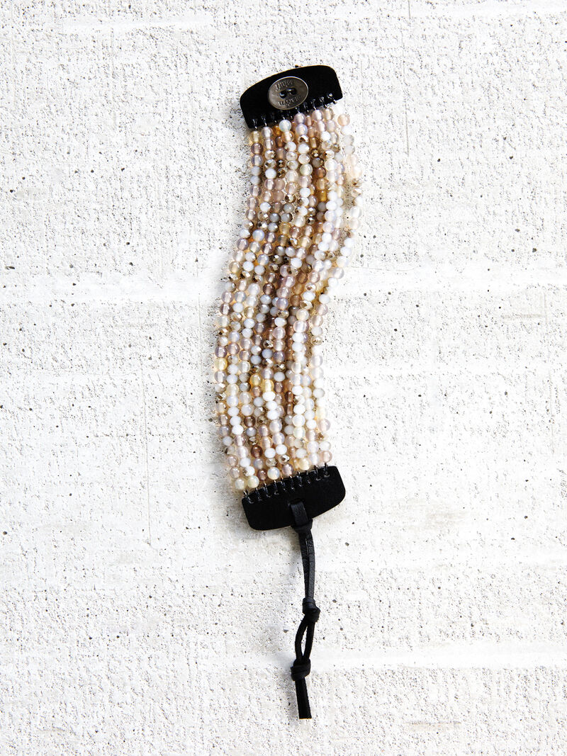 Woman Wears Marlyn Schiff Beaded Strand Bracelet image number 1