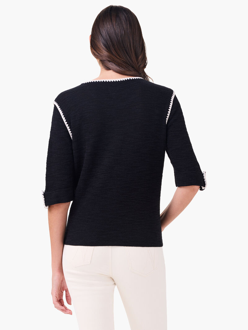 Woman Wears Stitched Up Sweater image number 2
