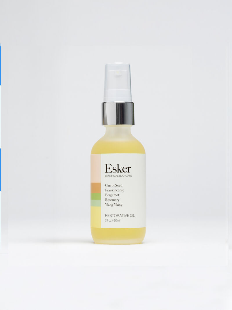 Woman Wears Esker - 2 Oz Restorative Body Oil image number 0