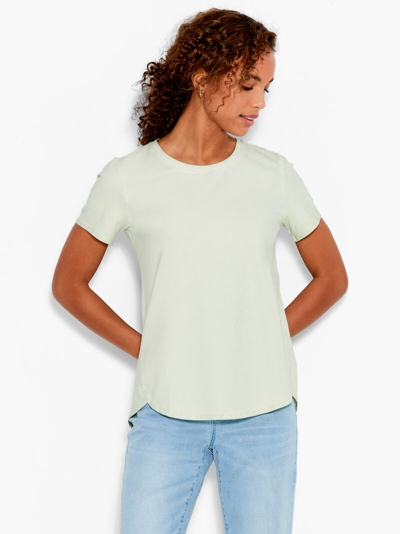 Woman Wears NZT Short Sleeve Shirt Tail Crew Tee image number 0