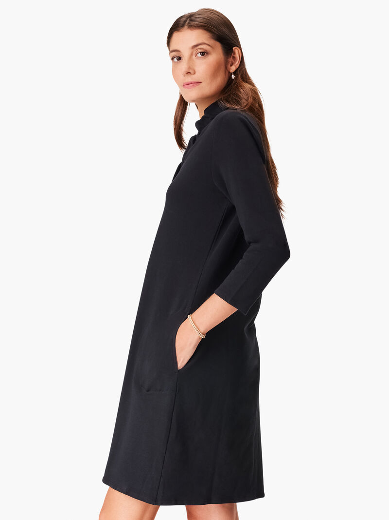 Woman Wears Ruffled Up Dress image number 1