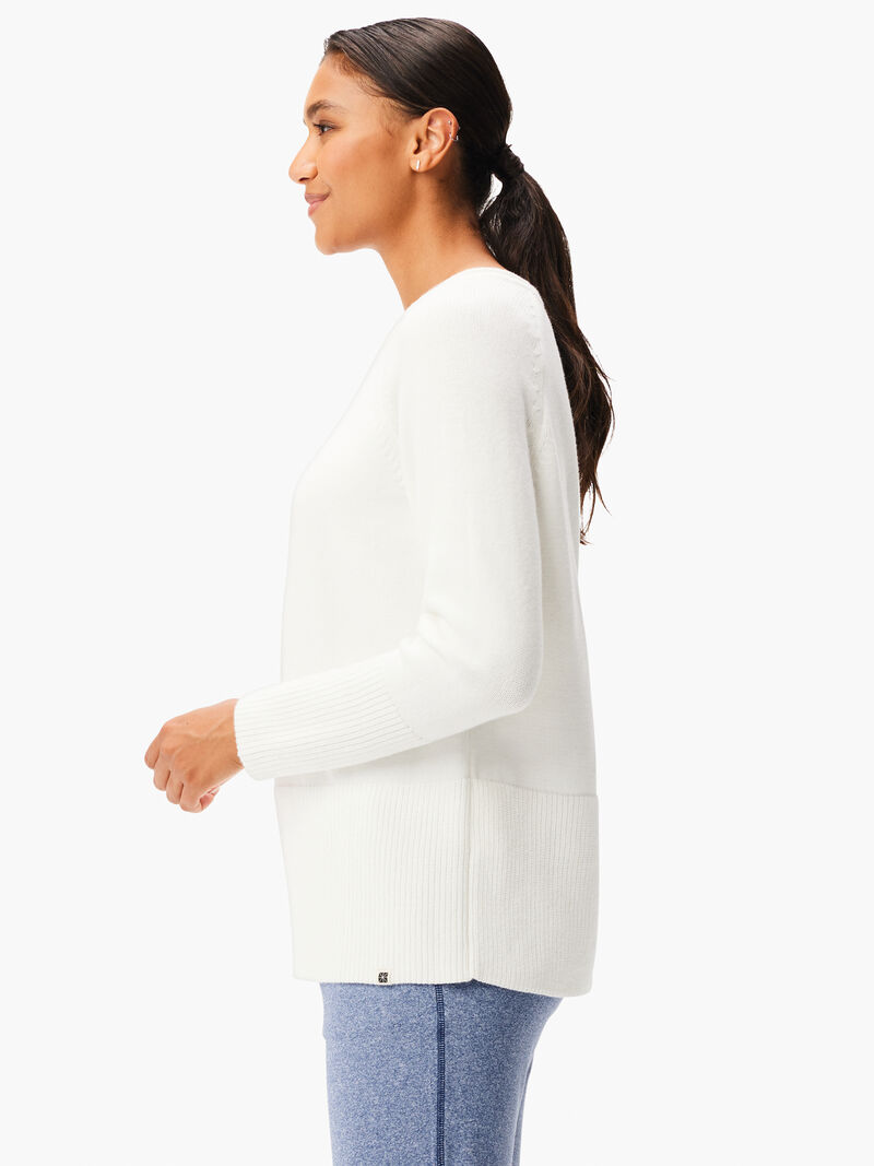 Woman Wears Cool Down Throw On Sweater image number 1