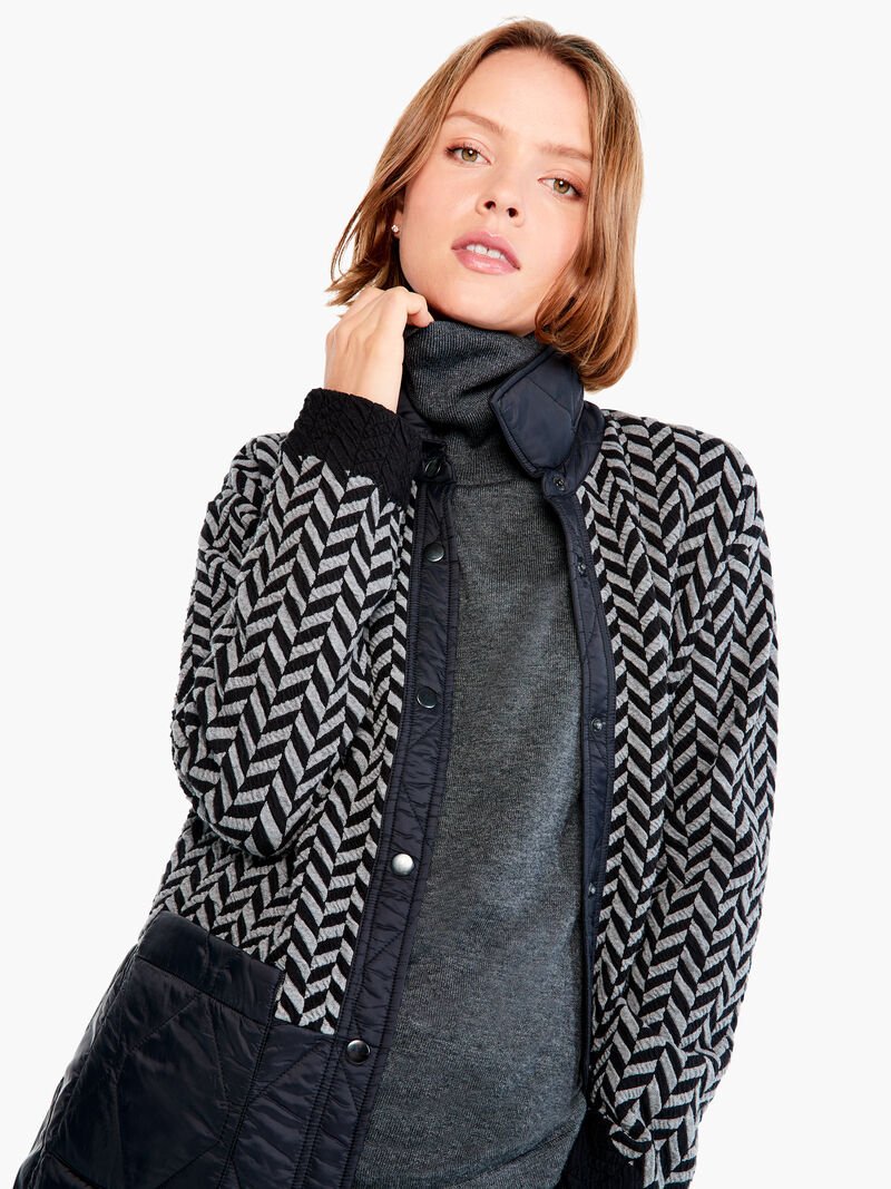 Woman Wears Quilted Mix Media Coat image number 0