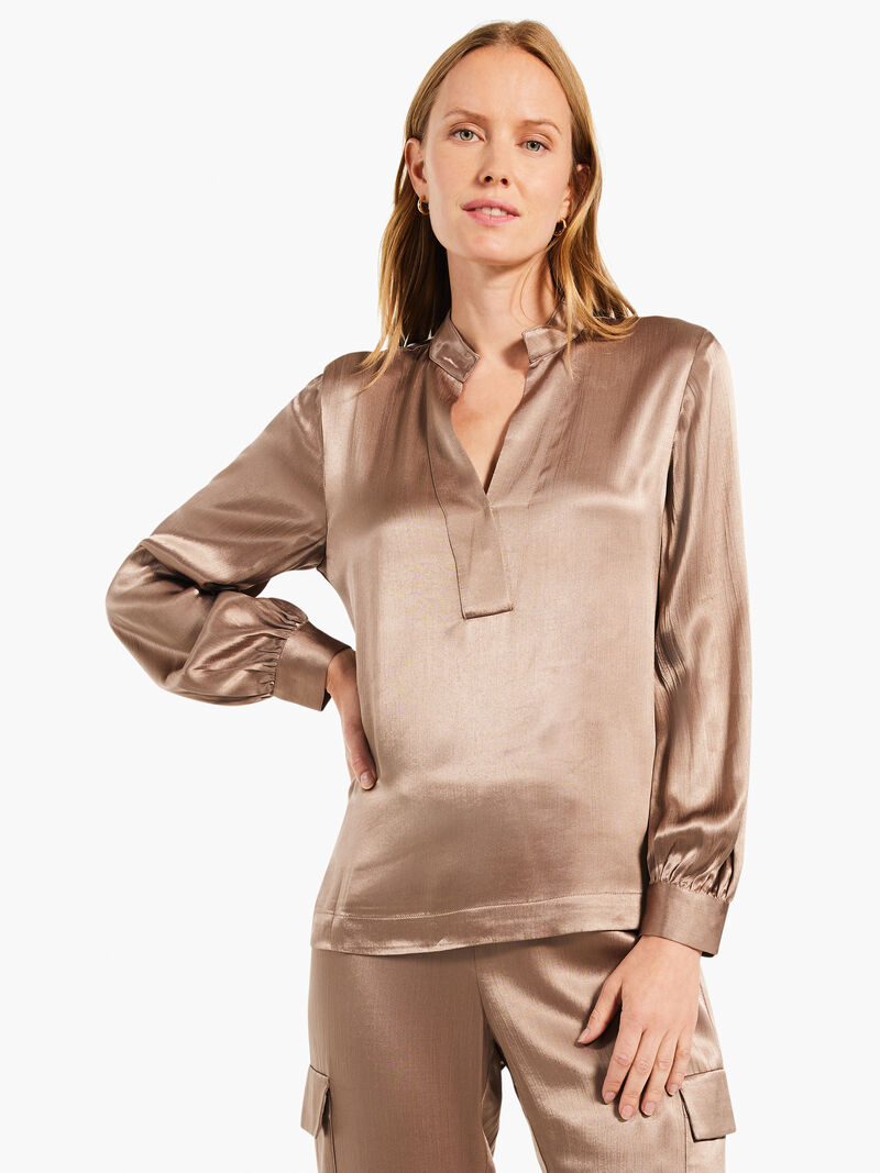 Woman Wears Elevated Top image number 1