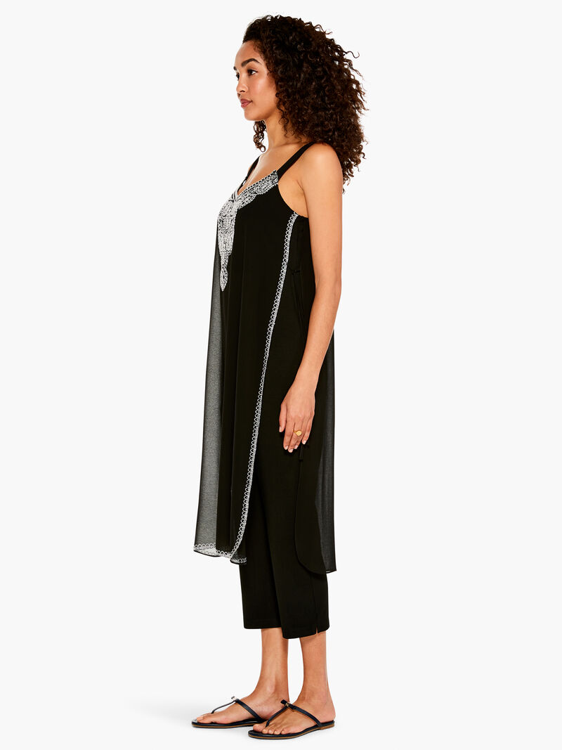 Woman Wears Flowing Jumpsuit image number 1