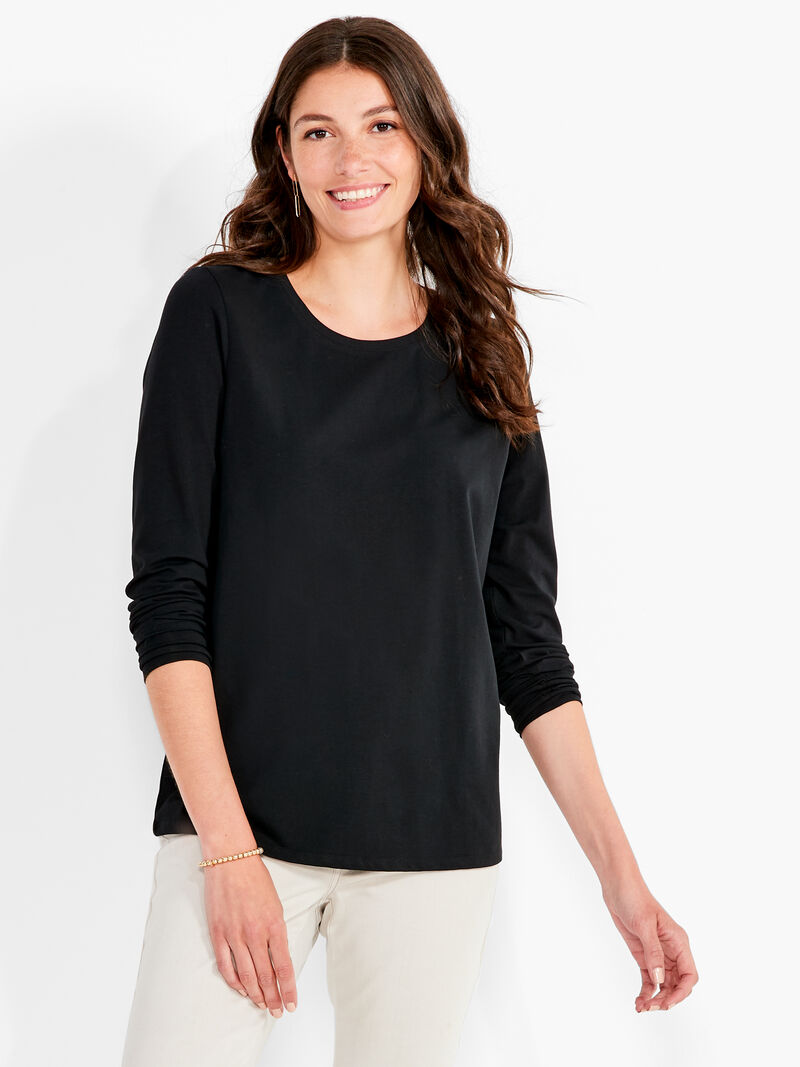 Woman Wears NZT Long Sleeve Crew Tee image number 0