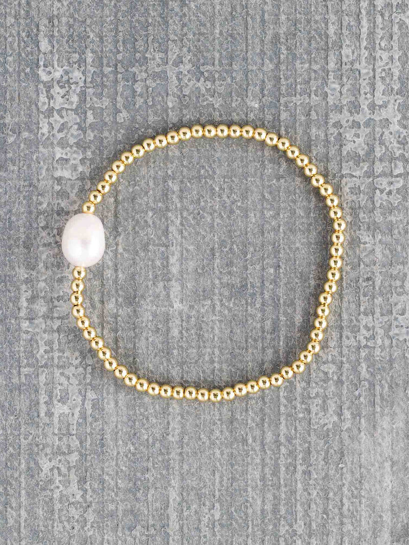 Woman Wears Marlyn Schiff Stretch Pearl Bead Strand image number 0