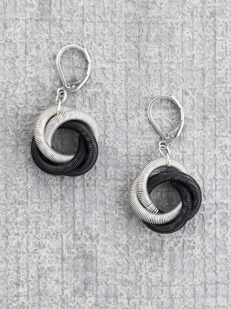 Woman Wears SEA LILY SILVER/BRONZE FLOATING KNOT EARRING image number 0