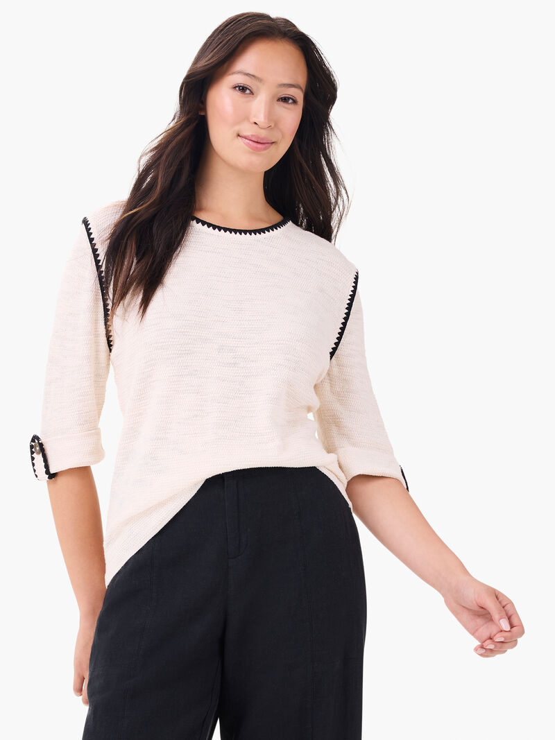 Woman Wears Stitched Up Sweater image number 0