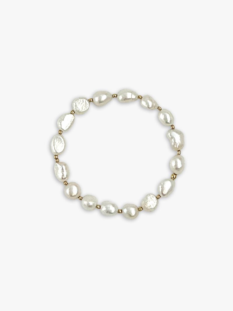 Woman Wears Paula Rosen 8 oz Peral Bracelet - Pearl & Gold Bead image number 0