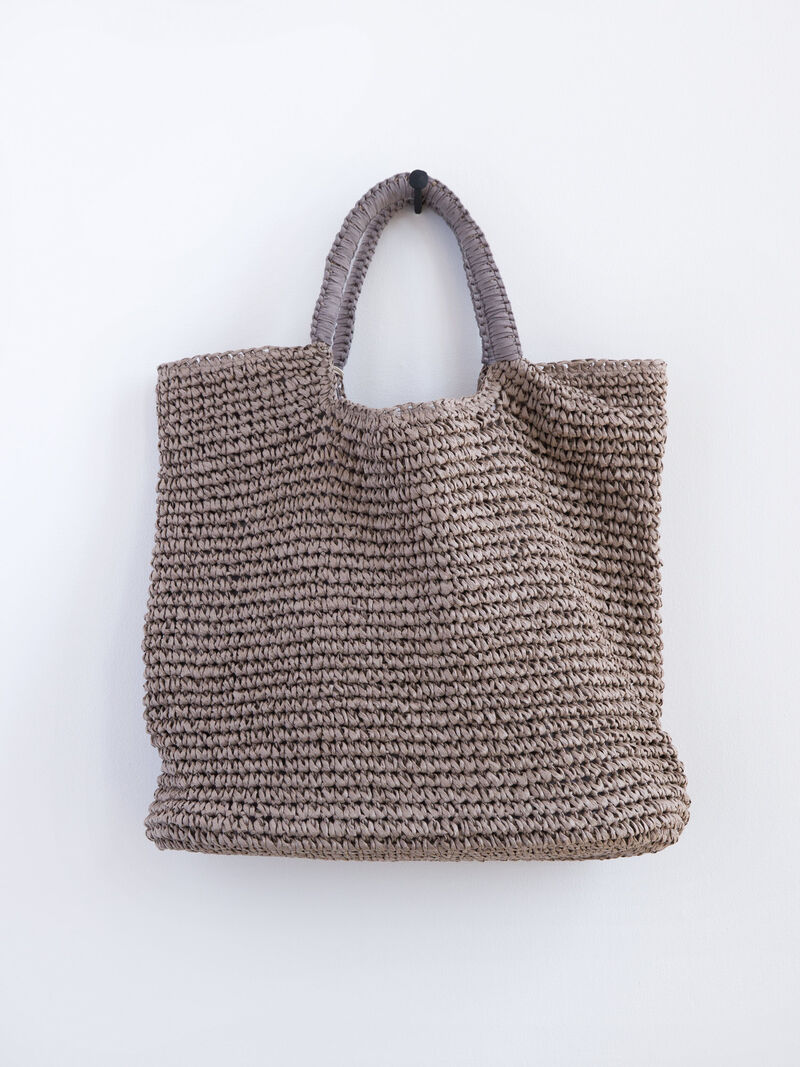 Woman Wears Fallon & Royce Mel Oversized Tote image number 1