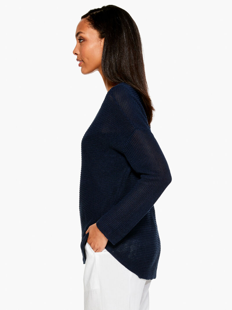 Woman Wears Summer Sweater image number 1