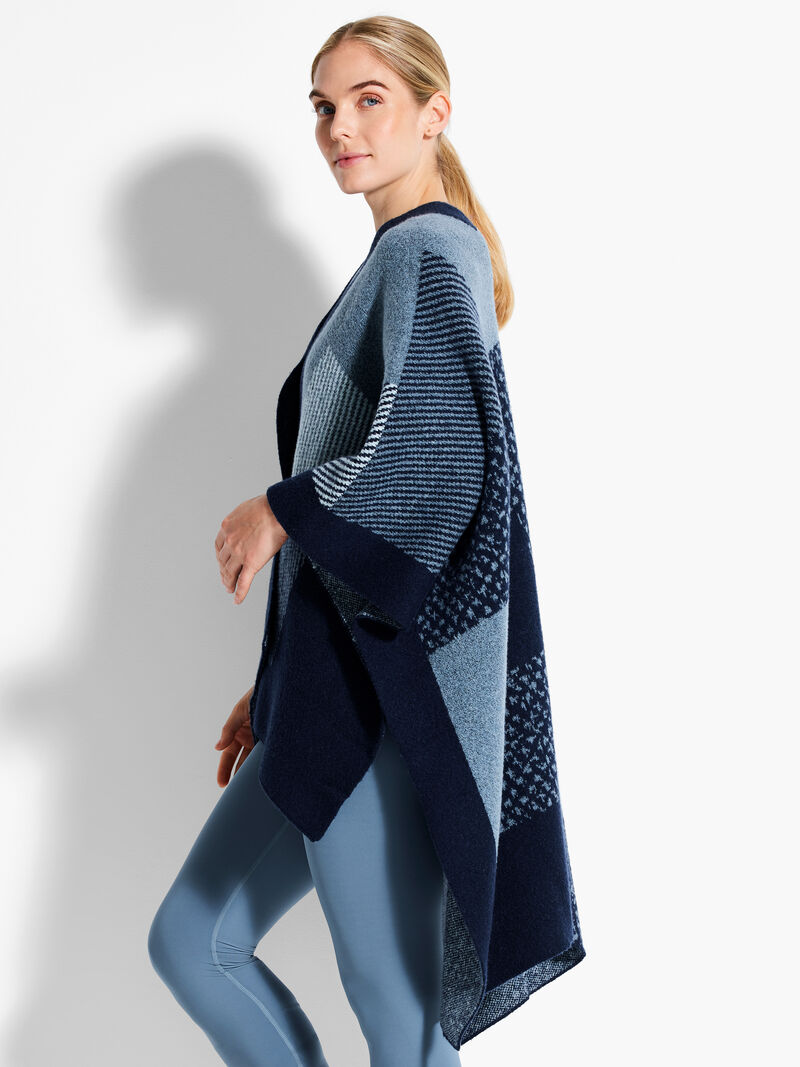 Woman Wears Cozy Reversible Jacquard Poncho image number 1