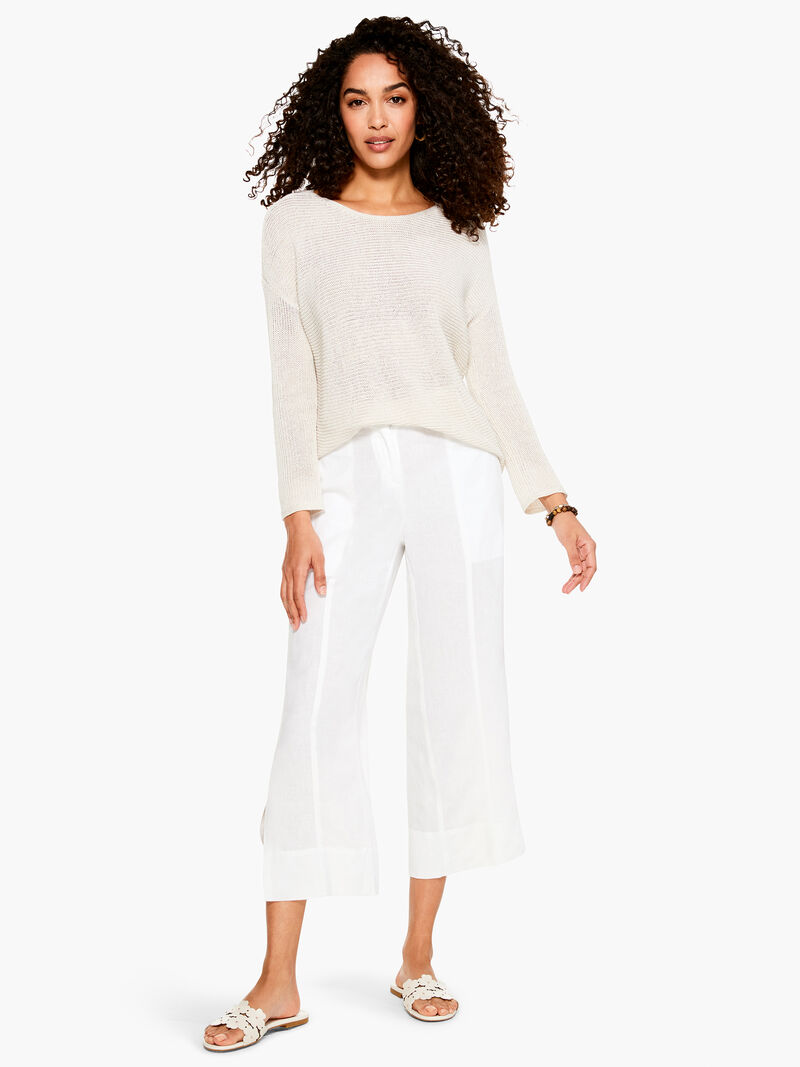 Woman Wears Summer Sweater image number 1
