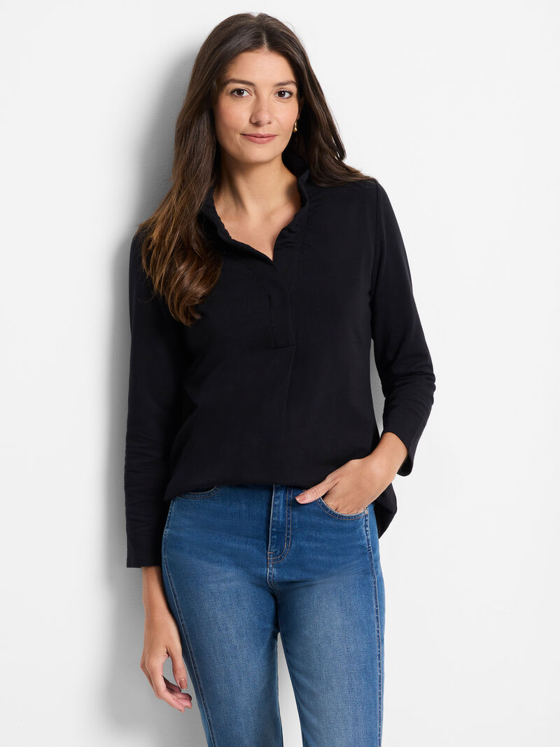 Woman Wears Ruffled Up Top image number 0