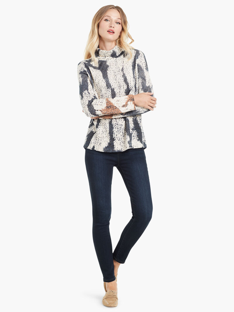 Woman Wears Tundra Turtleneck image number 3