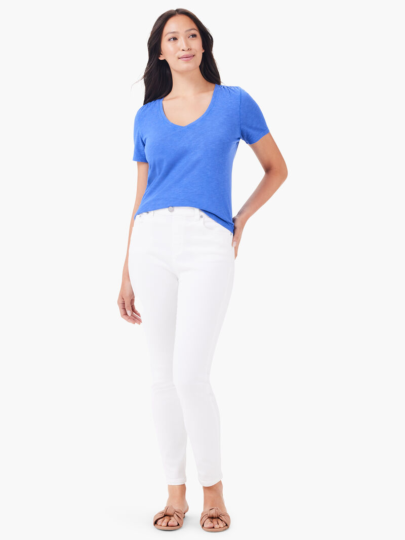 Woman Wears NZT Short Sleeve V-Neck Tee image number 1