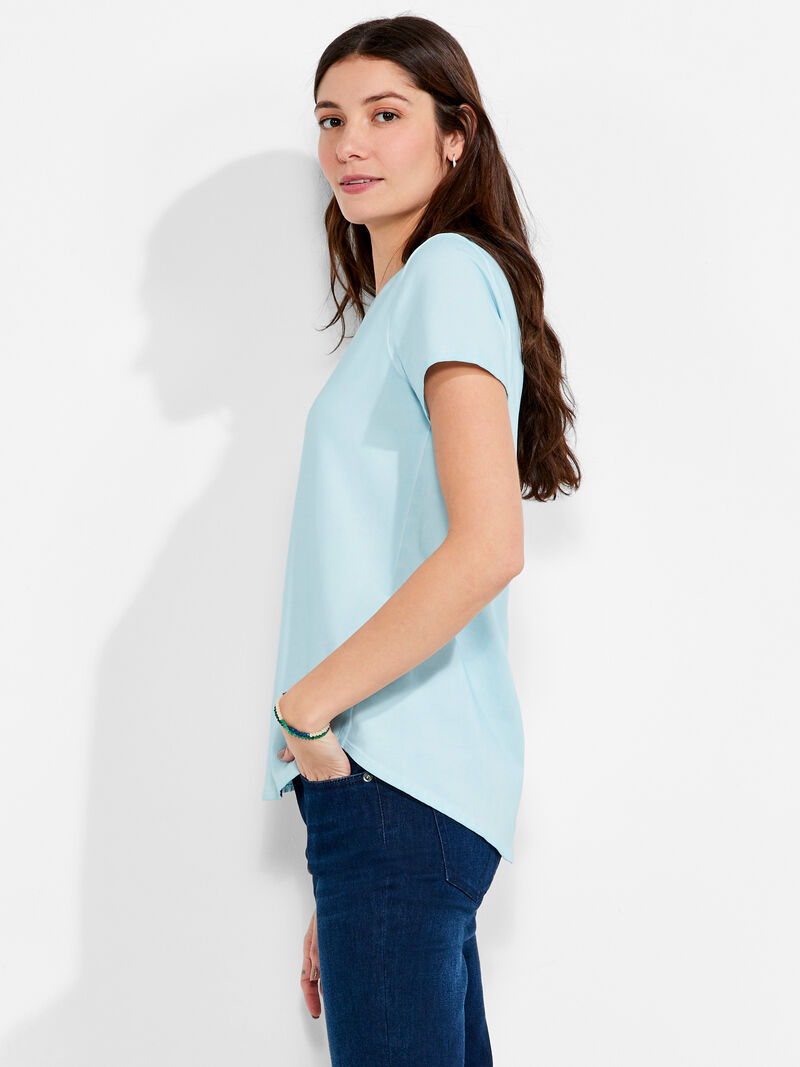 Woman Wears NZT Short Sleeve Shirt Tail Crew Tee image number 1