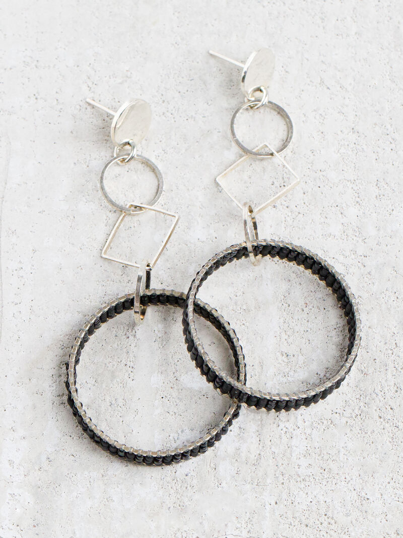 Woman Wears Circle Earring image number 0