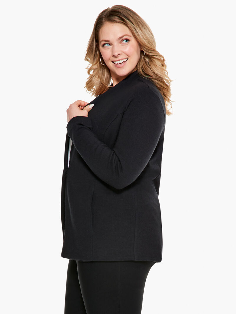 Woman Wears Sleek Knit Jacket image number 1