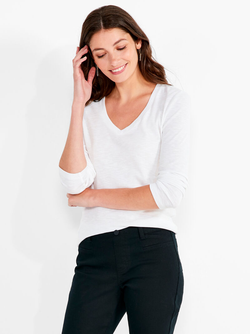 Woman Wears NZT Long Sleeve V Tee image number 0