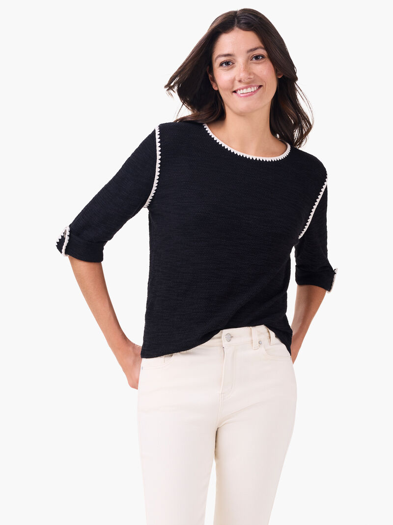 Woman Wears Stitched Up Sweater image number 0