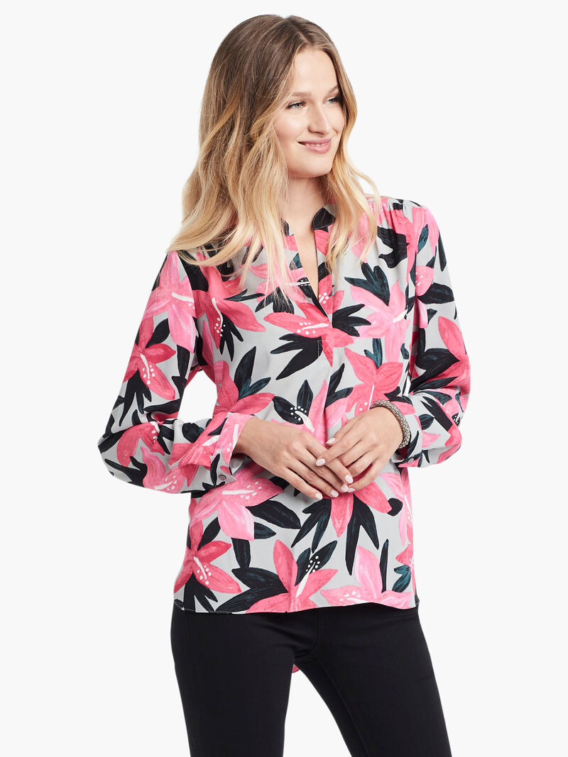 Woman Wears Poinsettia Blouse image number 0