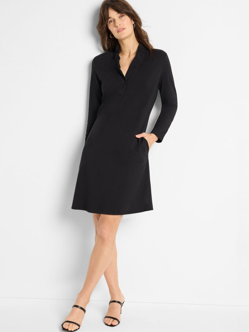 Woman Wears Ruffled Up Knit Dress image number 0