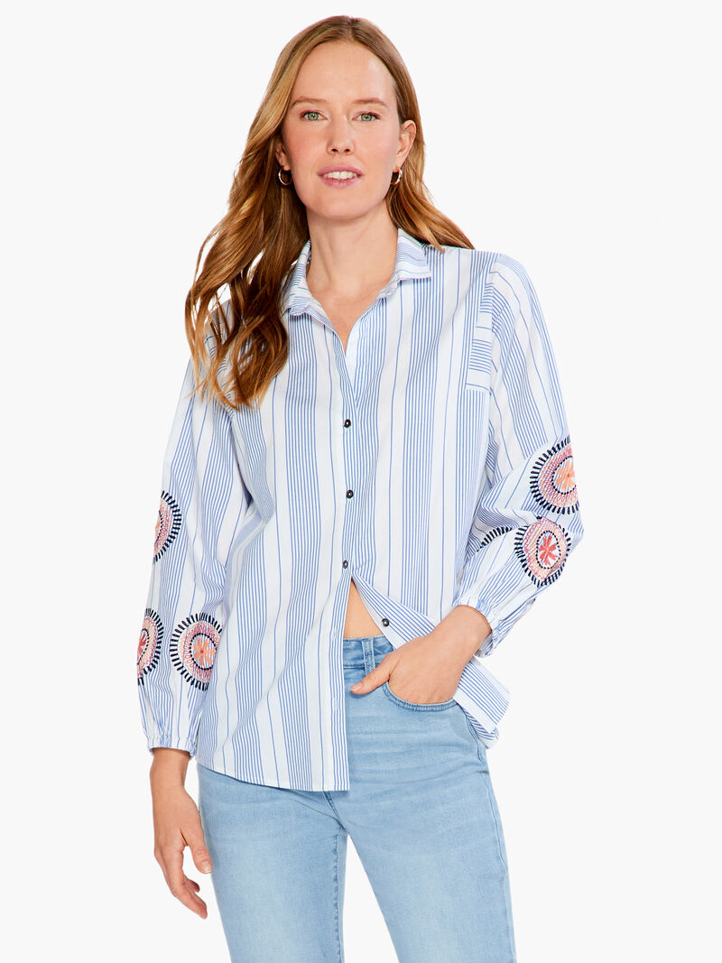 Woman Wears Embroidered Skies Shirt image number 0