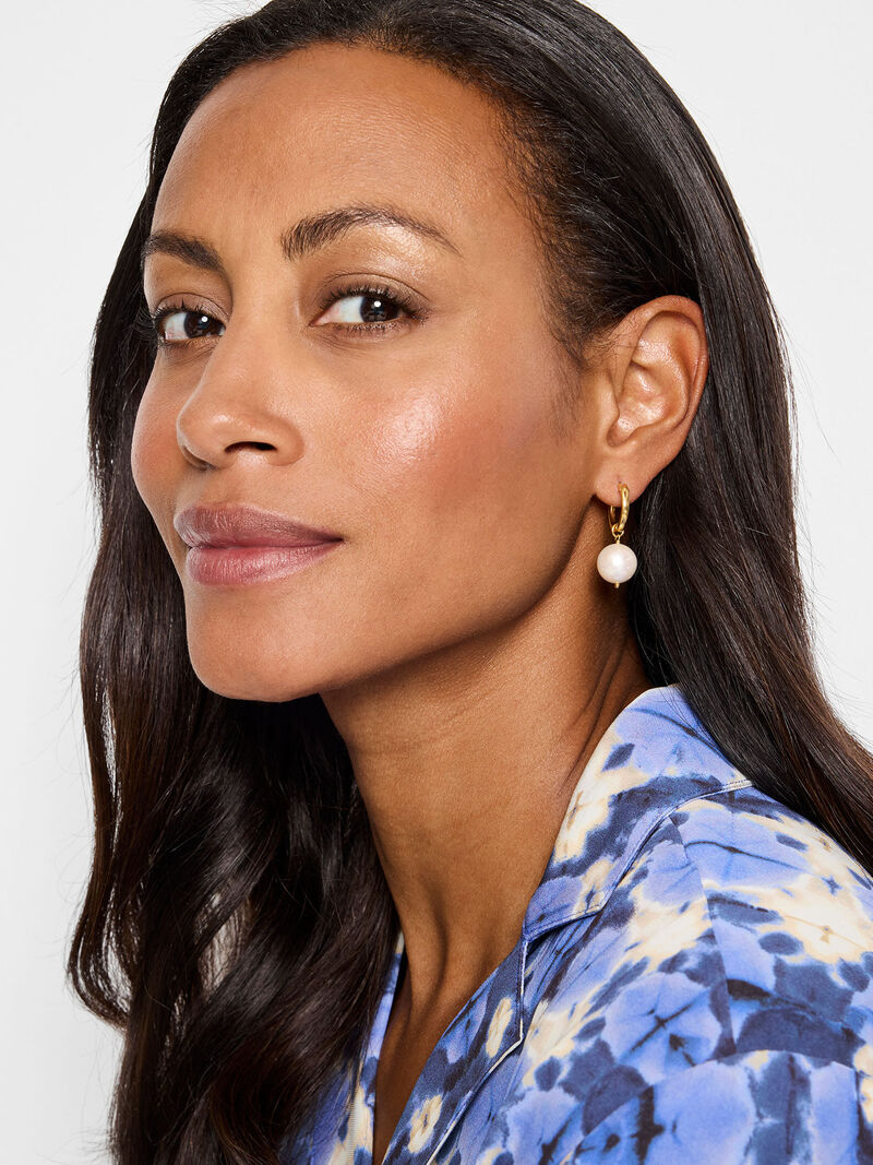 Woman Wears Chan Luu - White Baroque Pearl Hoop Earrings image number 1
