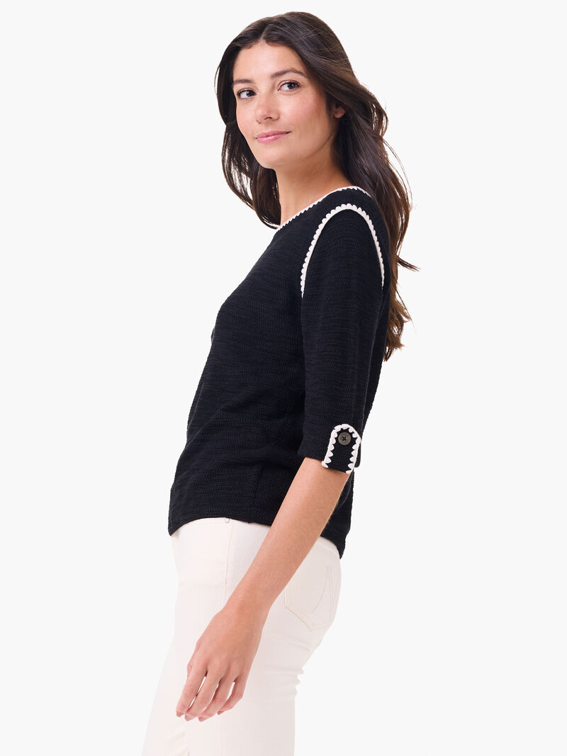 Woman Wears Stitched Up Sweater image number 1