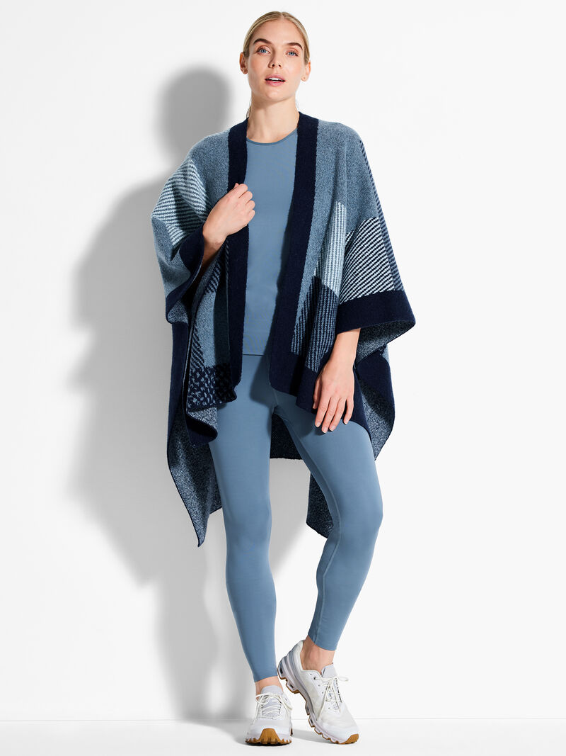 Woman Wears Cozy Reversible Jacquard Poncho image number 0