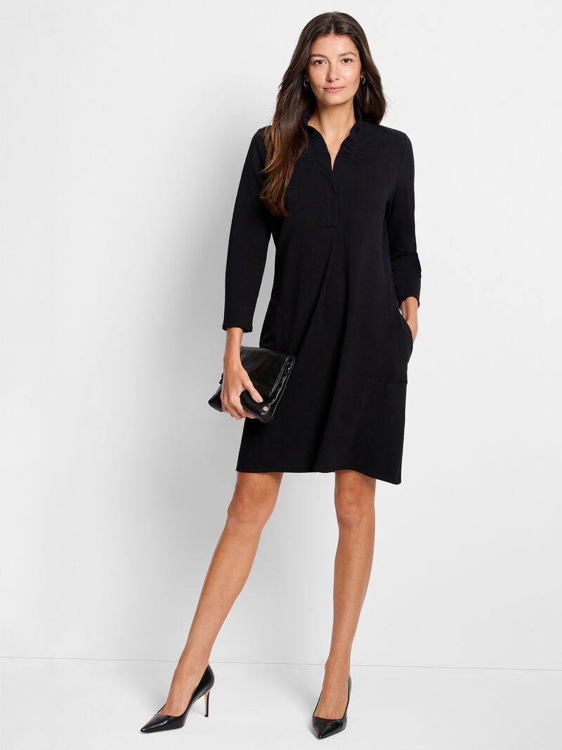 Woman Wears Ruffled Up Dress image number 1