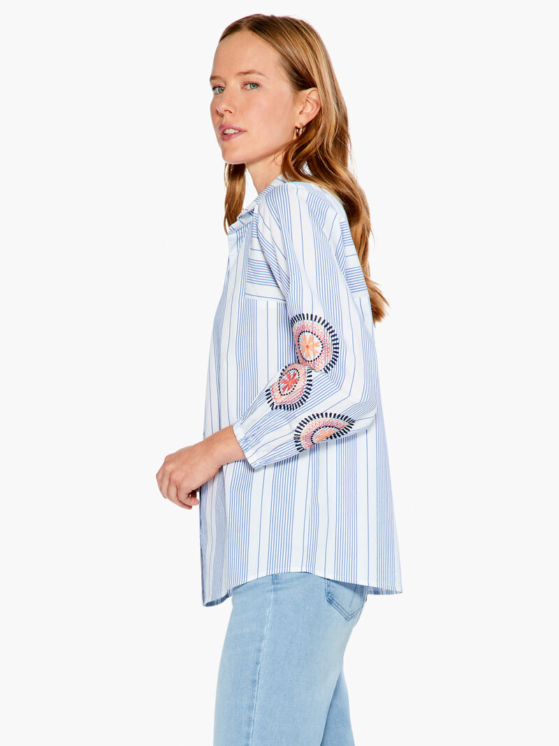 Woman Wears Embroidered Skies Shirt image number 1