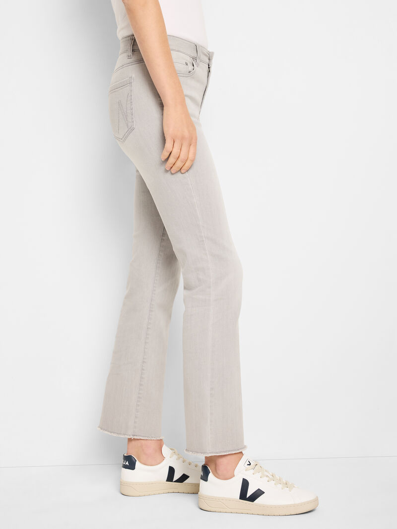 Woman Wears 28" Mid Rise Demi Boot Jeans image number 2