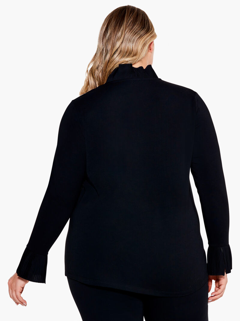 Woman Wears Ruffled Up Top image number 2
